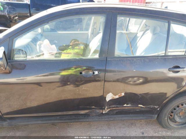 Nissan Versa 1.8s Image 10